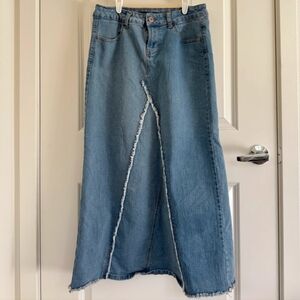 High waisted medium blue denim maxi skirt with frayed detail